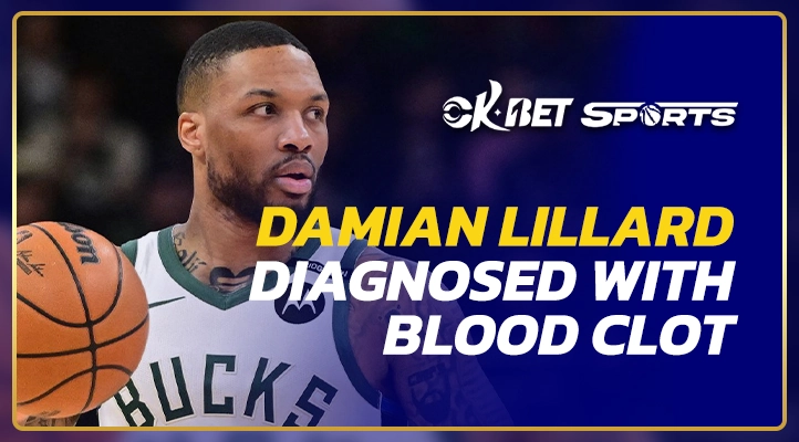 damian lillard man raising his hand wihile playing basketball